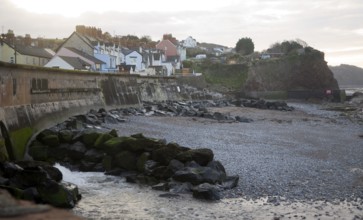 Washford River sea wall and village of Watchet, Somerset, England, United Kingdom, Europe