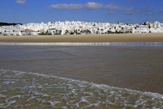 Wave breaking on sandy beach at Conil de la Frontera, Cadiz Province, Spain, Europe