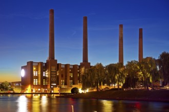 Wolfsburg NordSüd cogeneration plant in the evening with Mittellandkanal, Volkswagen AG main plant,