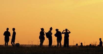 The Drachenberg in Berlin is well visited at sunset. A wind farm near Nauen in Brandenburg can be