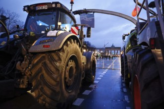 Thousands of farmers demonstrate with their tractors against the planned cancellation of the