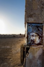 Fortress wall with picture of Jimi Hendrix, evening mood in the harbour town of Essaouira, Morocco,