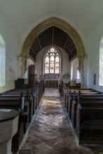 Interior view to altar and east window church of All Saints, Rede, Suffolk, England, UK