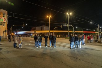 Transport of a 68 metre long, 22 tonne blade of a wind turbine, here in Schwelm, onlookers, with a