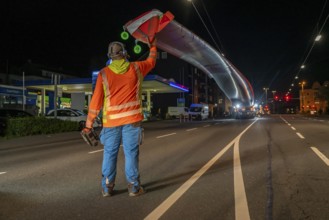 Transport of a 68 metre long, 22 tonne blade of a wind turbine, here in Schwelm, with a