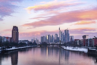 The skyline of Frankfurt am Main, skyscrapers of the banking district, Flößerbrücke, wintry