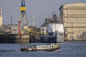 Blohm + Voss shipyard, new corvette of the German Navy, Karlsruhe, at completion, scaffolded ship,