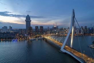 The skyline of Rotterdam, with the Erasmus Bridge over the Nieuwe Maas, Netherlands