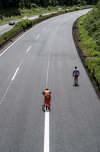 Marking work after the renewal of the road surface on the A40 motorway between the Kaiserberg