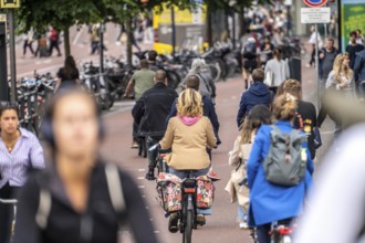 Central cycle path at the Vredenburgviaduct, in the city centre of Utrecht, lanes for pedestrians,