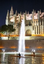 Palma de Majorca, Bay of Palma, the Cathedral of St Mary, kayakers in the lake in front of the