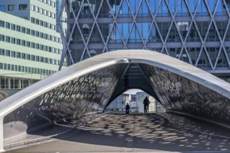 The Parkbruk, cycle and pedestrian bridge in the city centre of Antwerp, crosses a multi-lane city