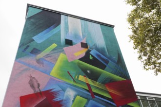 Abstract mural in bright colours on a school building, by graffiti artist Mad C, Düsseldorf, North