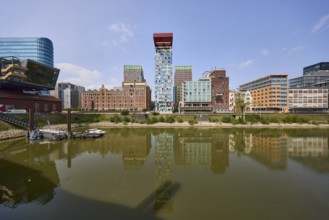 Modern architecture with reflections on the water surface in Düsseldorf Media Harbour, state