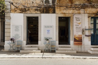 Façade with souvenir shop, blue olives, olive oil, Stoupa, former fishing village, Mani, Greece,