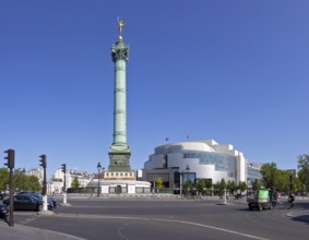 Victory Column on a large, sunny square in front of modern architecture, Paris