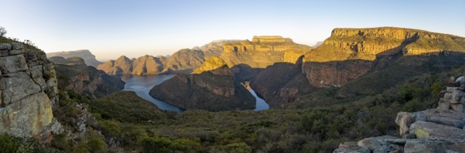 Panorama, sunset at Blyde River Canyon with Three Rondawels peak, view of canyon with Blyde River