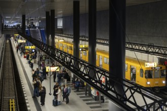 Berlin Central Station underground station. Platform with passengers on the U5 line to Hönow.