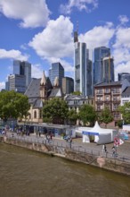 Main and skyscrapers with fan mile for the European Football Championship under a blue sky with