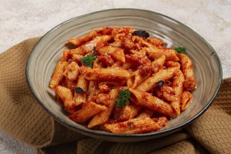 Penne pasta, with shrimp in tomato sauce, close-up, no people