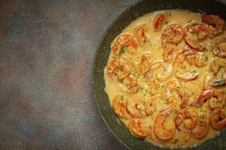 Shrimp in creamy garlic sauce, with spices and herbs