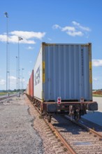 Freight wagons with containers on a railroad, Sweden, Europe