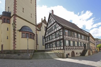 Half-timbered house with St Arbogast church, Haslach, Kinzigtal, Southern Black Forest, Black