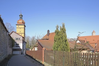 Historic Segringer Gate and houses with wooden fence, town wall, Dinkelsbühl, Middle Franconia,