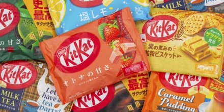 Different flavours of KitKat Kit Kat chocolate bar from Japan by Nestle as background panorama