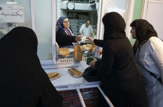 Sale of fresh bread, Barbol, Iran, 18/05/2016, Asia