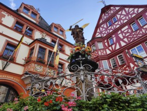 St Michael's Fountain with town hall and gabled half-timbered house, medieval market square, old