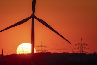 Emschergenossenschaft wind turbine, view to the west, in Essen, sunset, North Rhine-Westphalia,