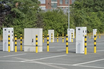 Empty charging station for electric cars, car park at the Opel plant, Rüsselsheim, Hesse, Germany,