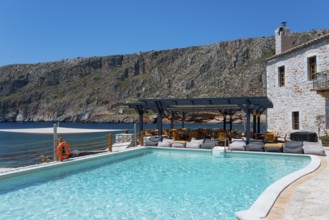 Luxurious swimming pool with sea and mountain views in glorious weather, Hotel Kyrimai,