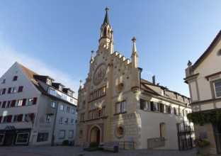 Hospital of the Holy Spirit, neo-Gothic façade, morning light, historic old town, Bad forest lake,