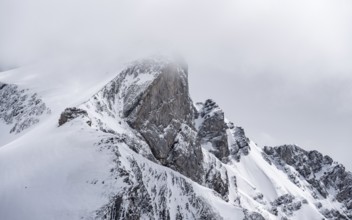 Snowy mountain landscape, cloudy mood, Bernese Alps, Bernese Oberland, Switzerland, Europe