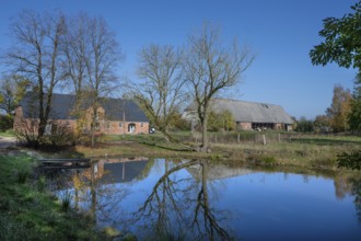 Othenstorf estate with former horse stable and large barn, built around 1900, in front the fire