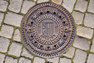 Manhole cover, Dresden city coat of arms, cobblestones, Dresden, state capital, independent city,