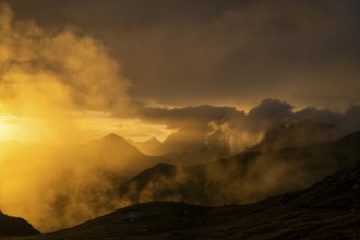 Montafon mountains with dramatic cloudy sky at sunset, Tschagguns, Rätikon, Montafon, Vorarlberg,