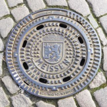 Manhole cover with the city Coat of Arms, Meissen, Saxony, Germany, Europe