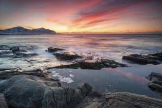 Sunset in winter at Skagsanden, rock formations on the beach at Flakstad, Flakstadøy, Lofoten,