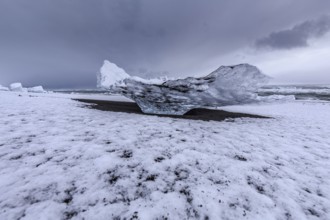 Ice floes on the beach, snowy, waves, sea, clouds, winter, Diamond Beach, Breidamerkursandur,