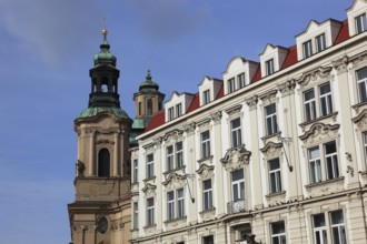 Historic houses and church tower of St Nicholas Church on Old Town Square, Prague, Czech Republic,