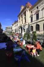 In the centre, event for children in front of the National Bank building on Lipscani Street,