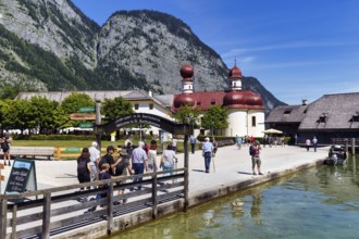 Pilgrimage church St. Bartholomä at Königssee with a group of tourists, Berchtesgaden National