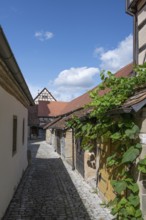 Inner courtyard with former so-called church arcades, barns in the historic fortified church,