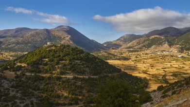 Askifou Fortress, A picturesque view over hills and a small village in the distance, Askifou