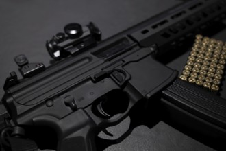 Modern Elegant Assault Rifle and Bullet on Grey Background in Switzerland