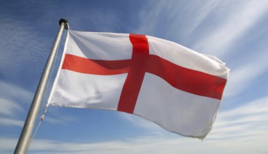 The flag of England, Great Britain, flutters in the wind