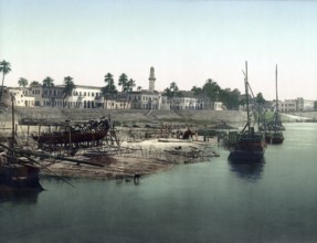 Aswan on the banks of the Nile, Egypt, Historical, digitally restored reproduction from a 19th